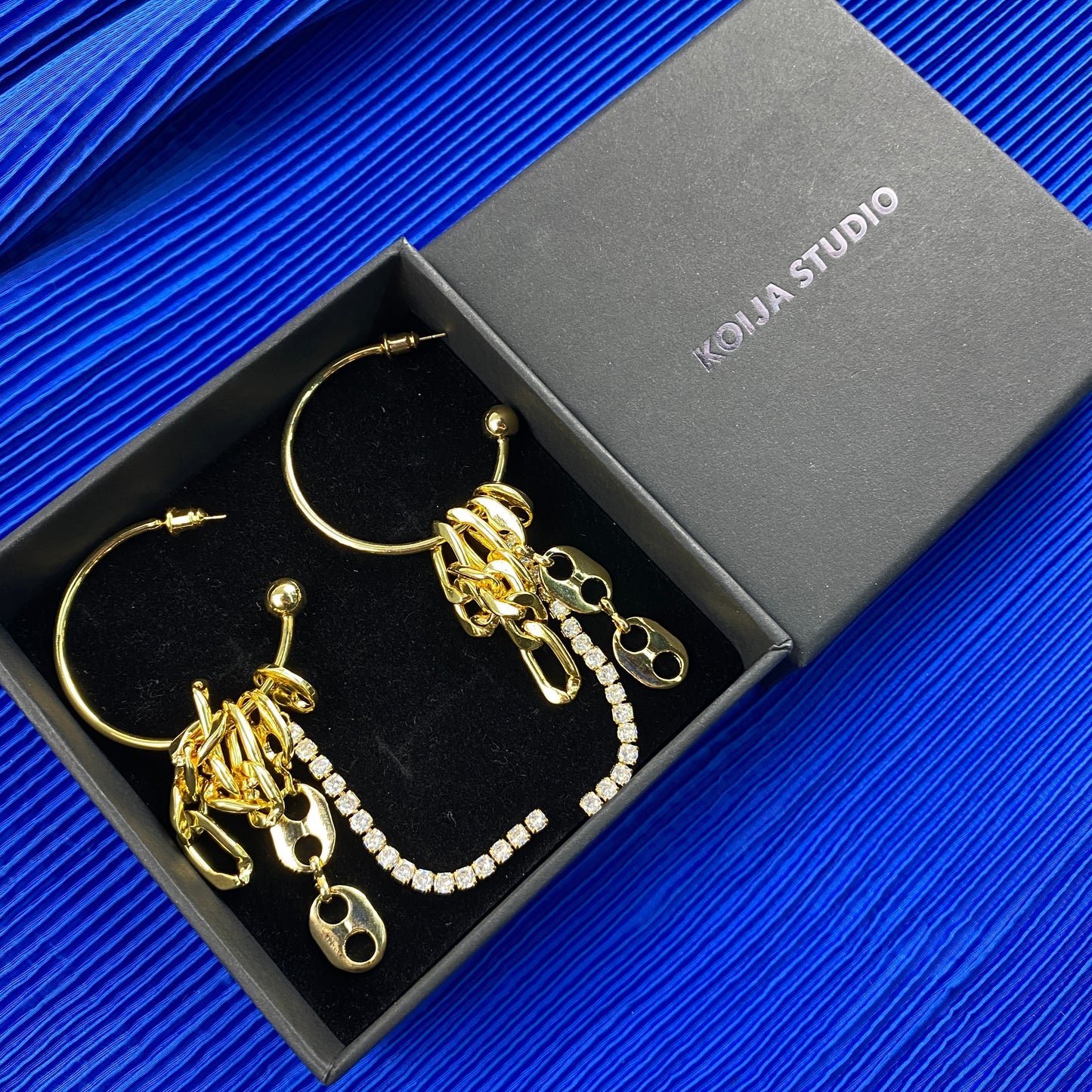 猪鼻扣水钻流苏耳环